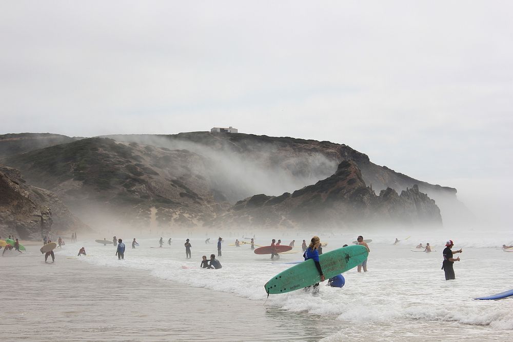 Surfers catching waves, sports photography. Free public domain CC0 image.