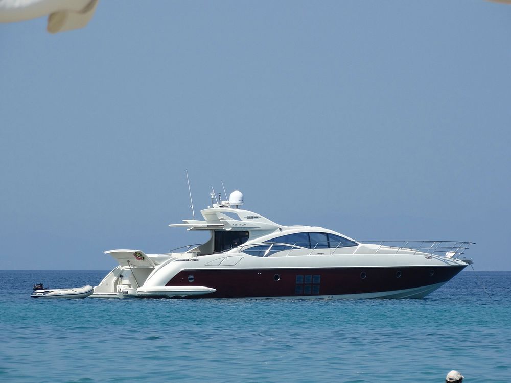 Yacht sailing in the sea. Free public domain CC0 photo.