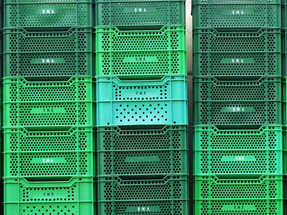 Green crates stack. Free public domain CC0 photo.