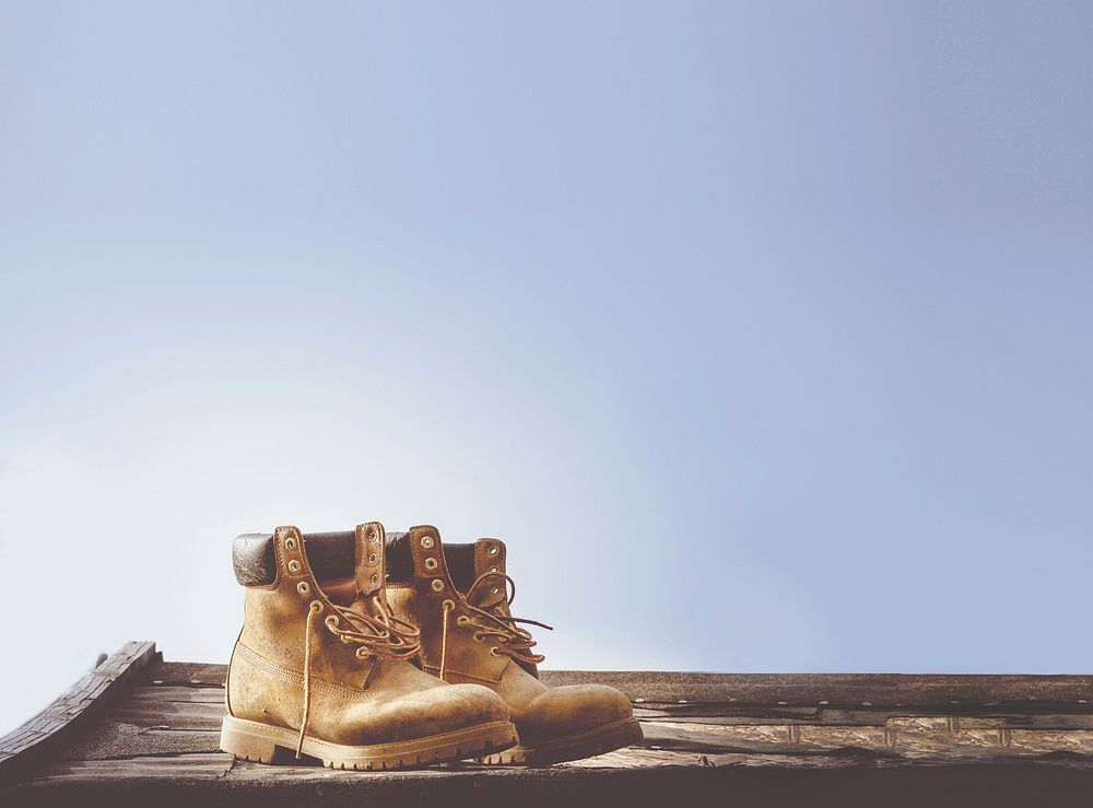 Brown shoes on a wooden surface. Free public domain CC0 image.