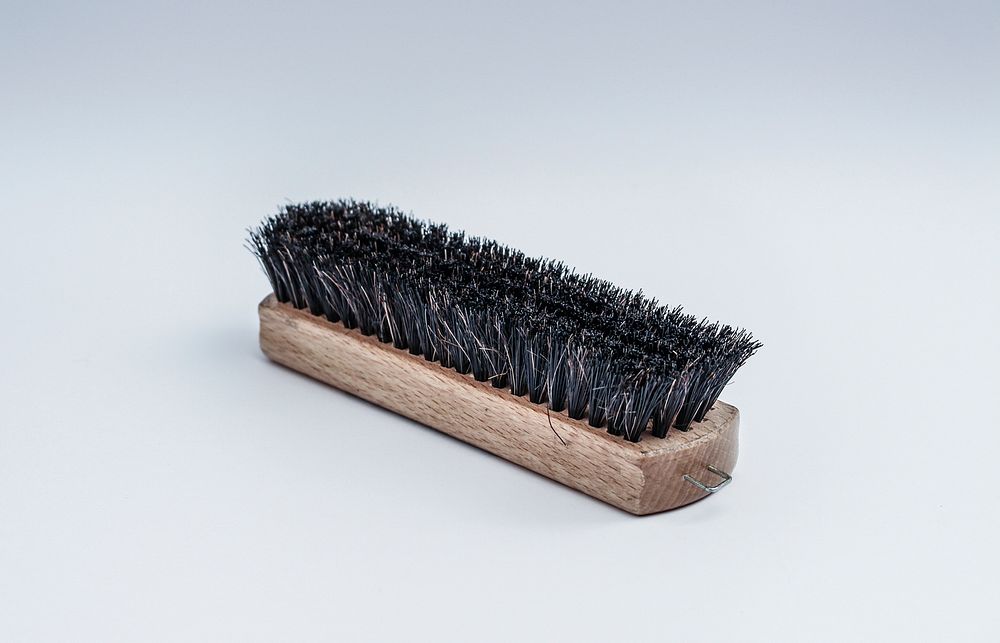 Wooden brush for cleaning clothes. Free public domain CC0 image