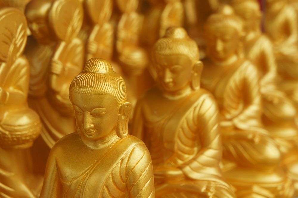 Golden Buddha statue background. Free public domain CC0 image.