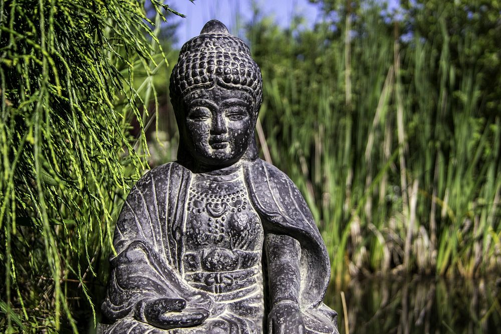 Buddha statue background in nature. Free public domain CC0 image.
