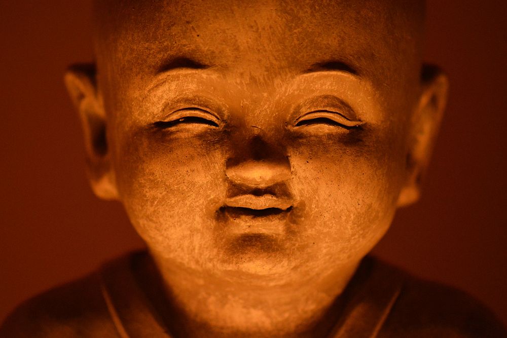 Buddha statue background. Free public domain CC0 image.