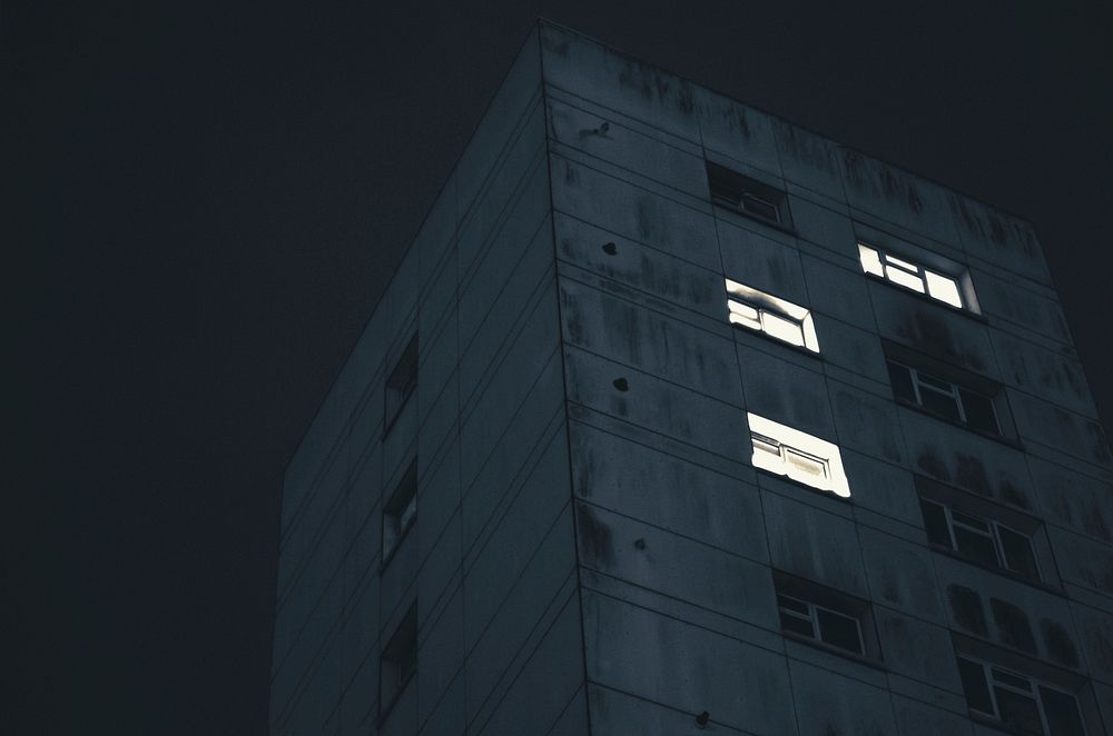Apartment building at night. Free public domain CC0 photo.