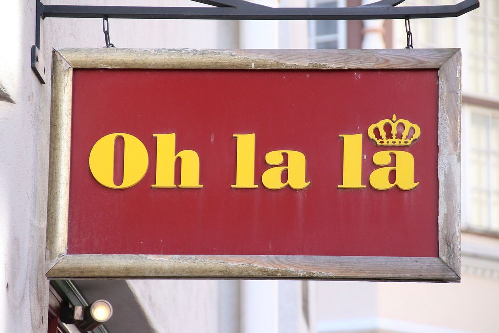 Street sign with oh la la words. Free public domain CC0 image