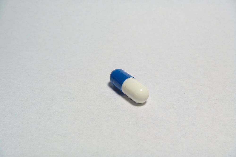 Medicine capsule. Free public domain CC0 photo.