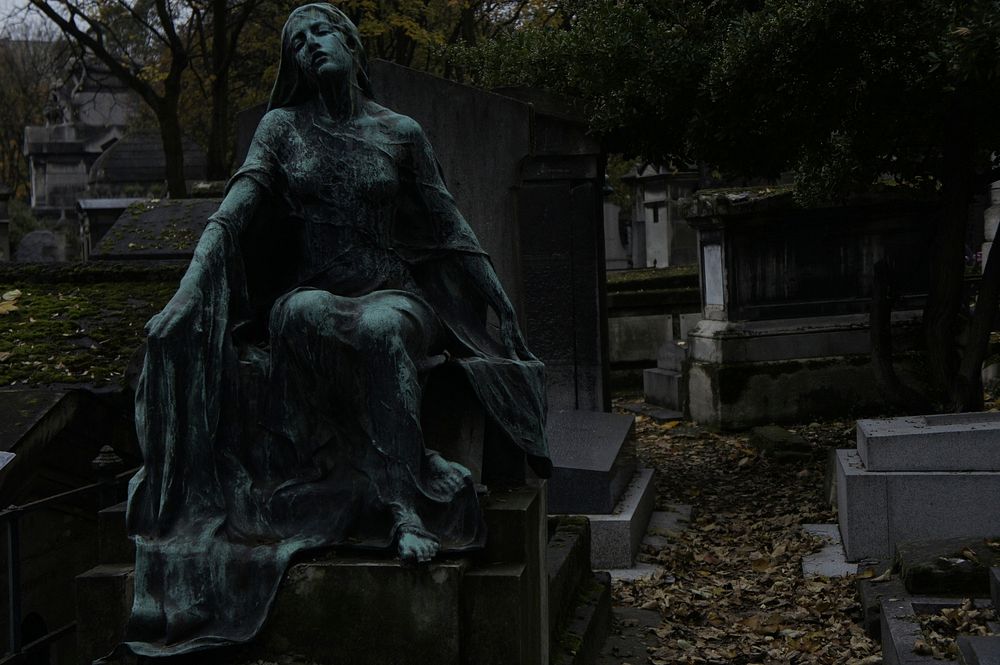 Mourning woman, old tomb sculpture, Paris, France. Free public domain CC0 image.