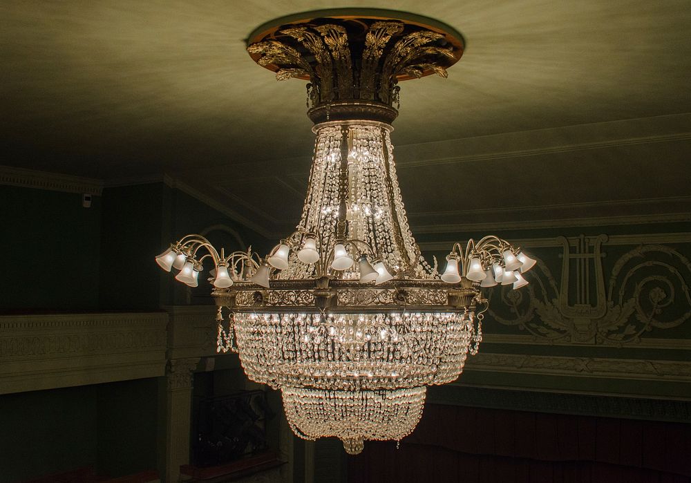 Elegant chandelier hanging from ceiling. Free public domain CC0 image.