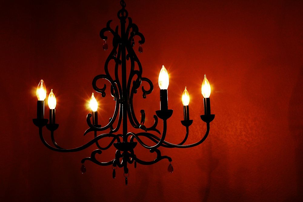 Candelabra lamp hanging from ceiling. Free public domain CC0 photo.