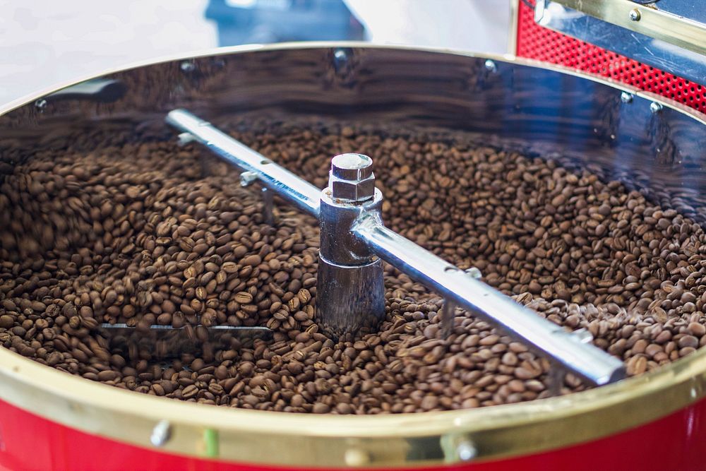 Fresh coffee beans in roasting machine. Free public domain CC0 photo
