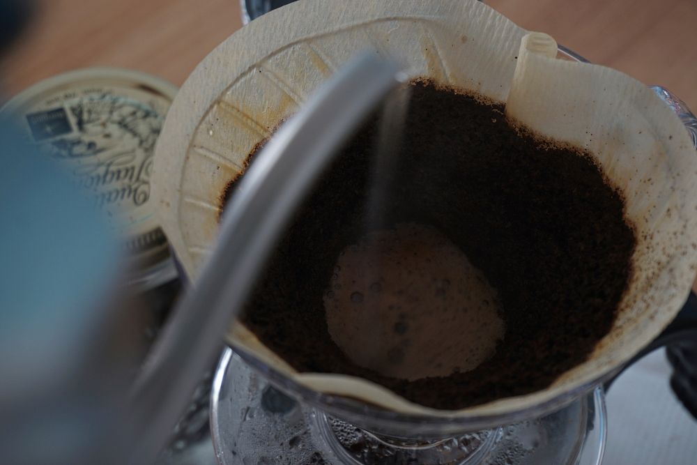 Person making fresh drip coffee. Free public domain CC0 photo