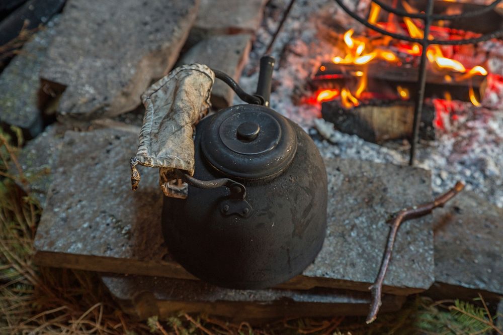 Boiling kettle with fire. Free public domain CC0 photo.