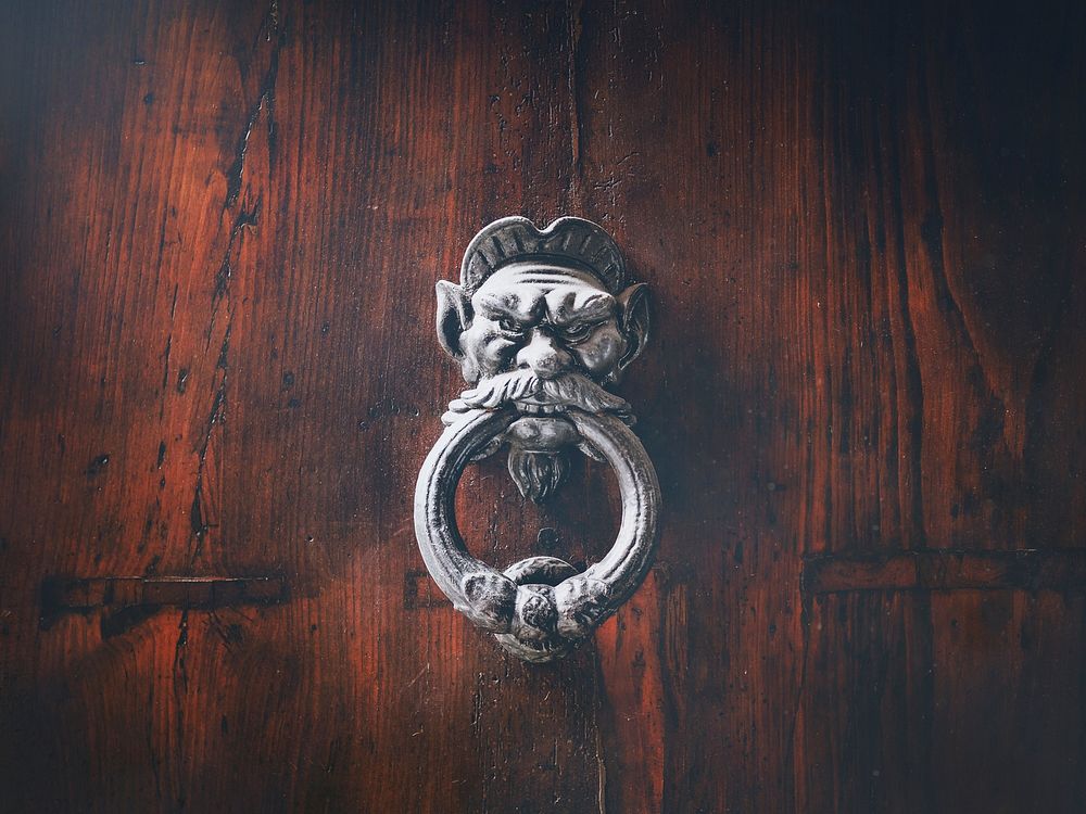 Decorative door knocker. Free public domain CC0 photo.