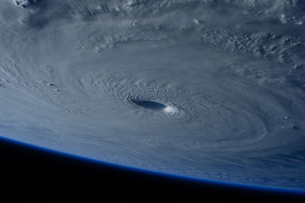 Storm clouds shot from space. Free public domain CC0 photo.