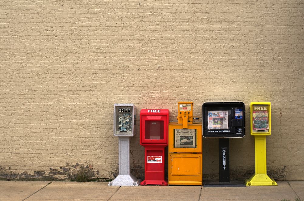 Newspaper machine. Free public domain CC0 photo.