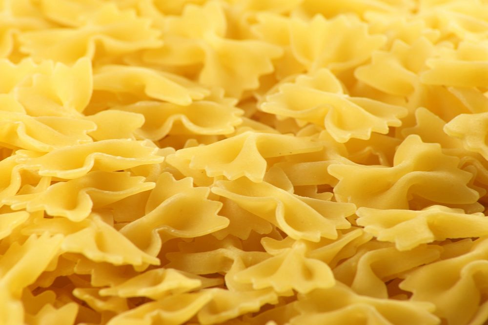 Pile of cooked bow pasta. Free public domain CC0 image.