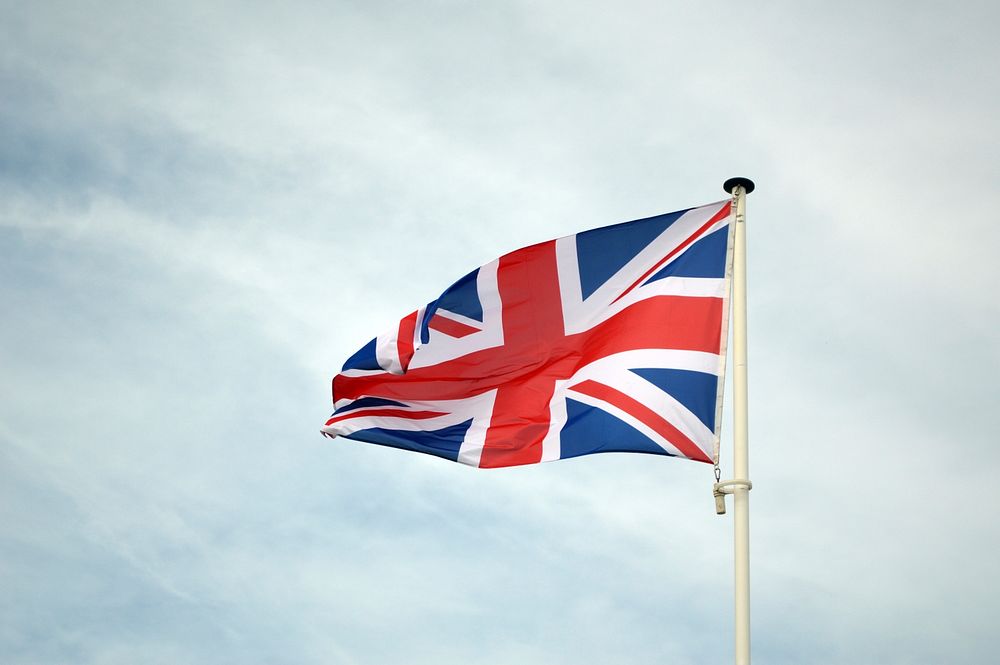 UK flag, blue sky. Free public domain CC0 photo.