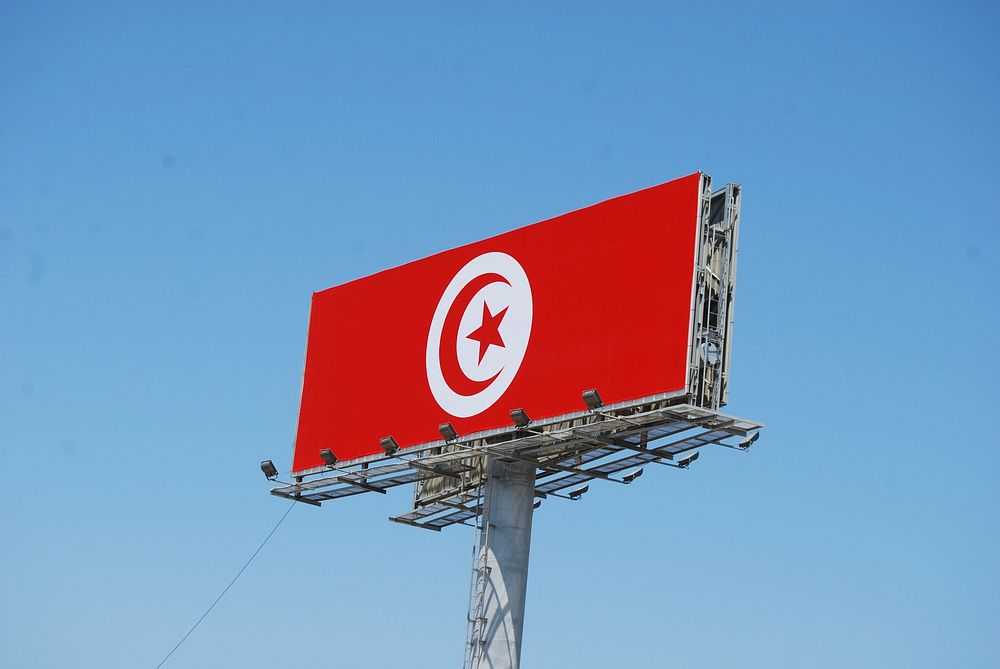 Tunisian flag on billboard. Free public domain CC0 image.