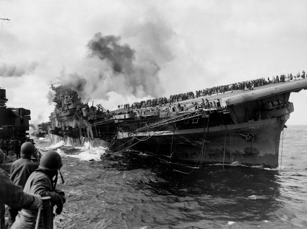 Aircraft carrier ship sinking. Free public domain CC0 photo.