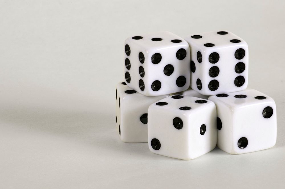 White dice, gambling addiction. Free public domain CC0 photo.