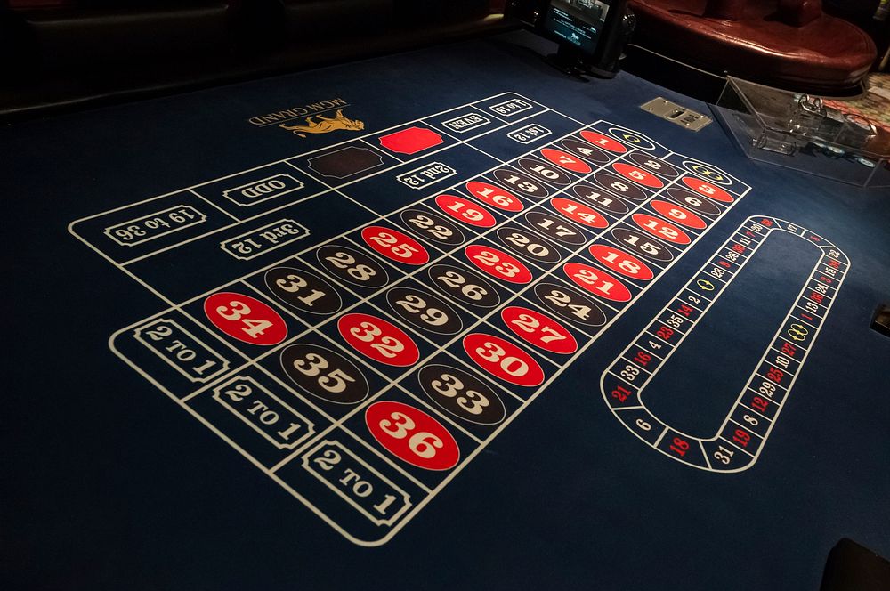 Casino table, gambling addiction. Free public domain CC0 photo.