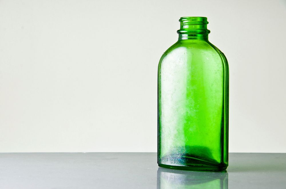 Green glass bottle. Free public domain CC0 image.