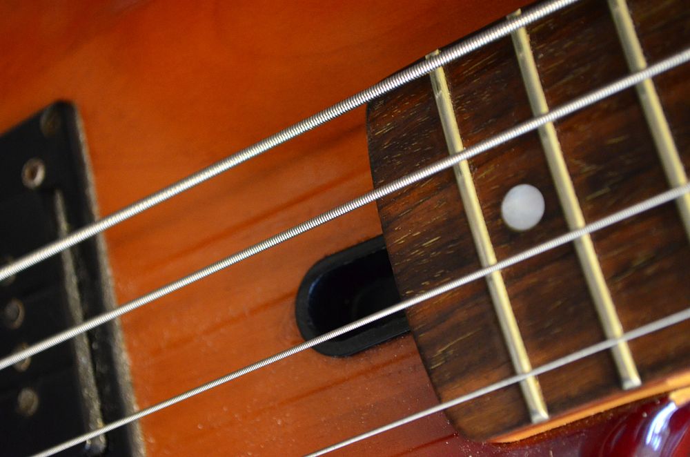 Bass guitar, musical instrument background. Free public domain CC0 photo.