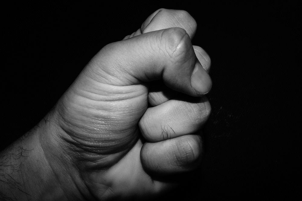 Clasped fist, close up. Free public domain CC0 photo.