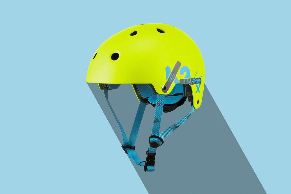 Closeup on yellow bike helmet. Free public domain CC0 photo.