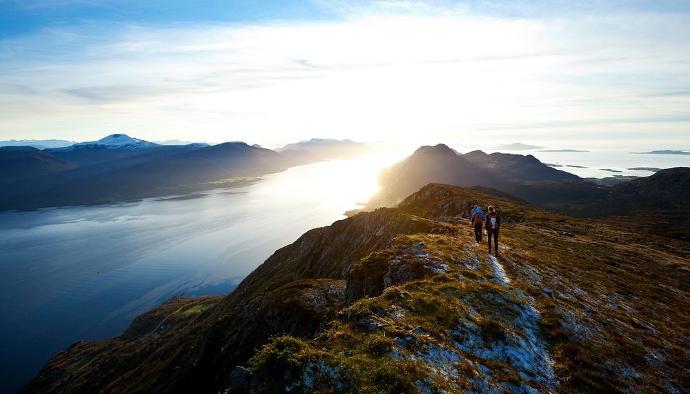 Travelers hiking in mountain. Free public domain CC0 photo.