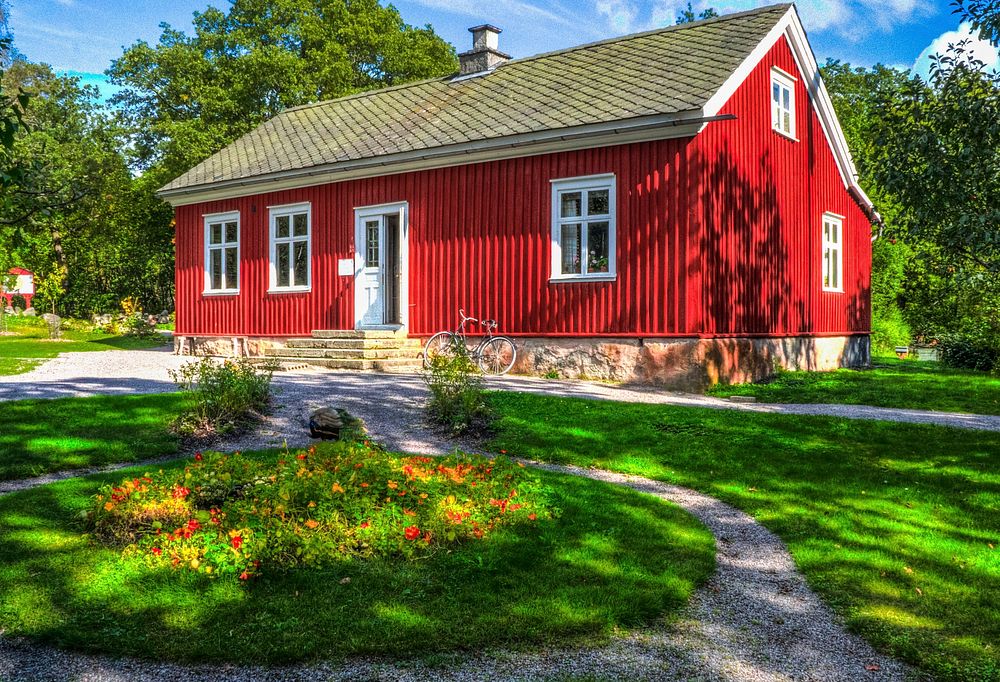 Traditional Swedish red house during summer. Free public domain CC0 photo.