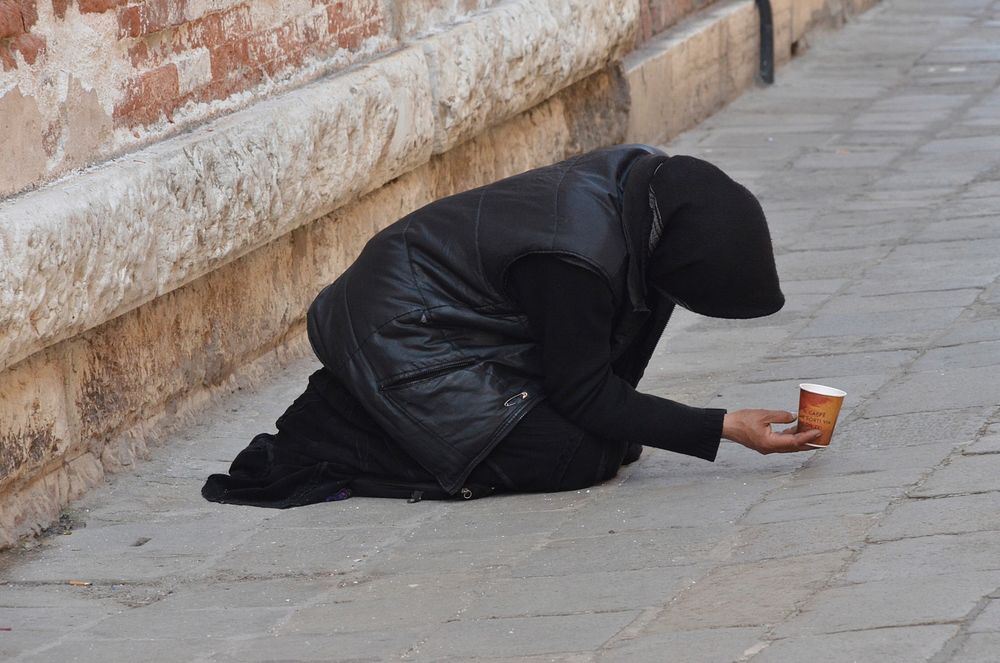 Woman beggar. Free public domain CC0 photo.