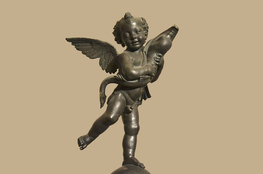 Closeup on The Little Angel with Dolphin. Free public domain CC0 image.