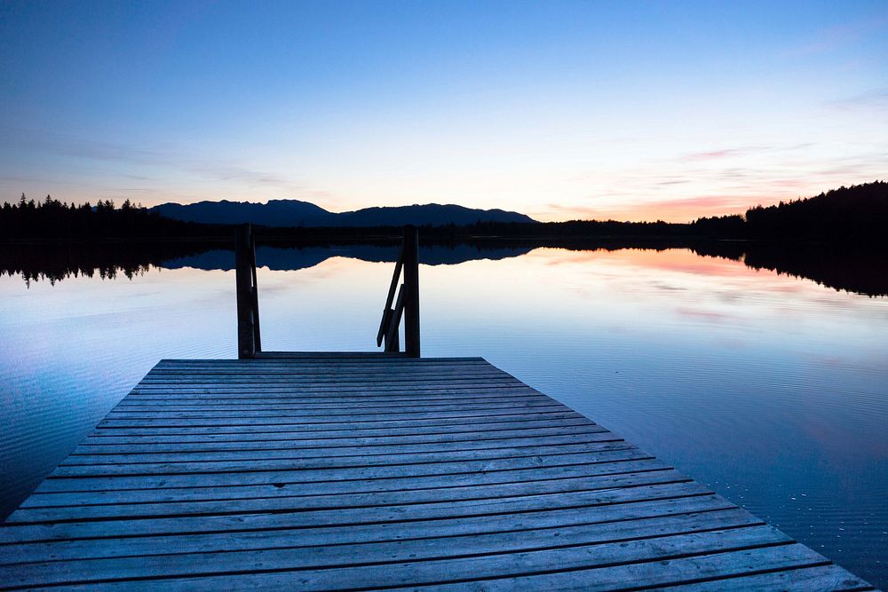 Pier at sunset. Free public domain CC0 image.