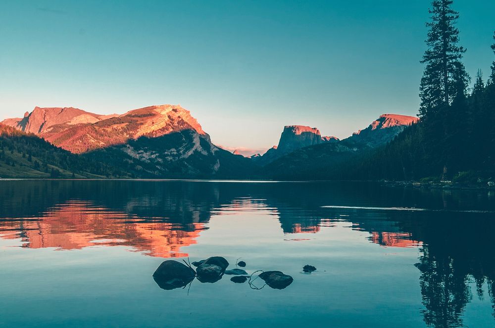 Mountain with lake during sunset. Free public domain CC0 photo.