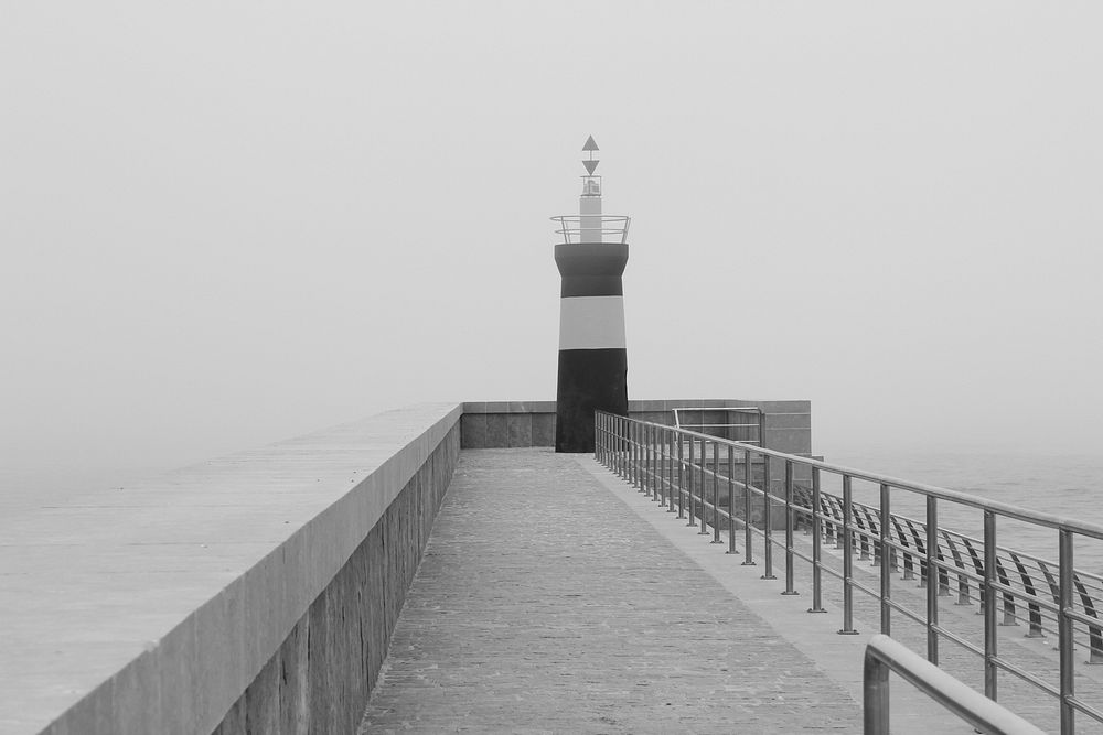 Lighthouse in black and white. Free public domain CC0 image.