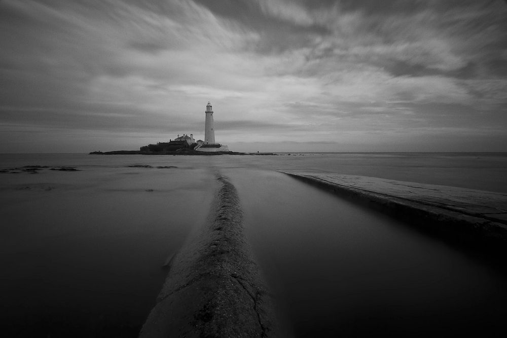 Lighthouse in black and white. Free public domain CC0 photo.