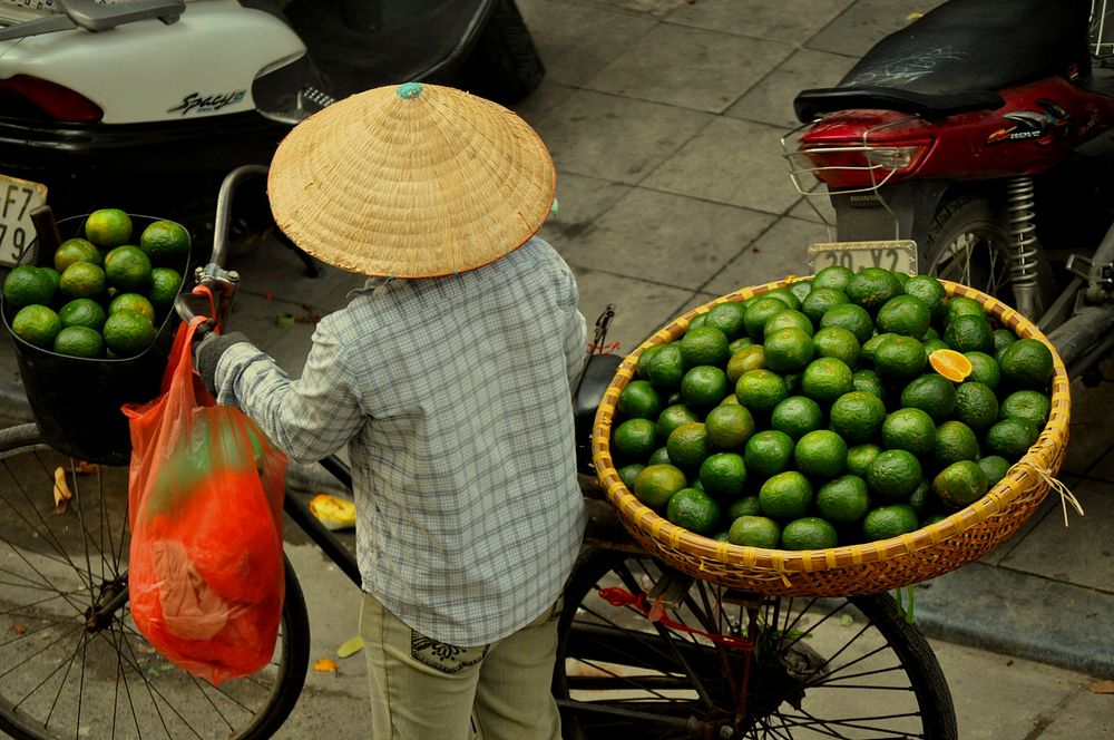 Lime vendor with a bike. Free public domain CC0 photo.