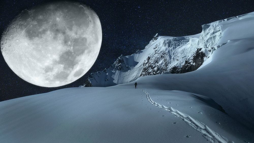 Snow-capped mountain with big moon in background. Free public domain CC0 photo.