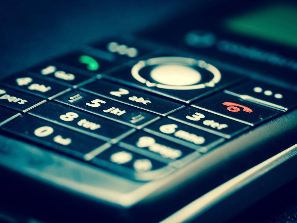 Closeup on old mobile phone. Free public domain CC0 image.