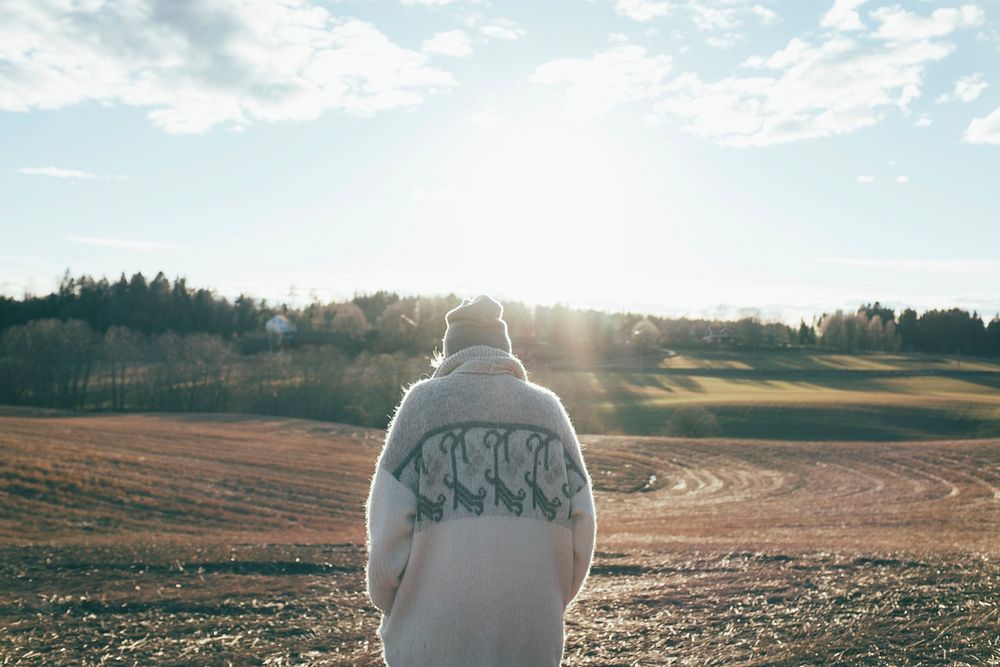 Man standing in field. Free public domain CC0 photo.