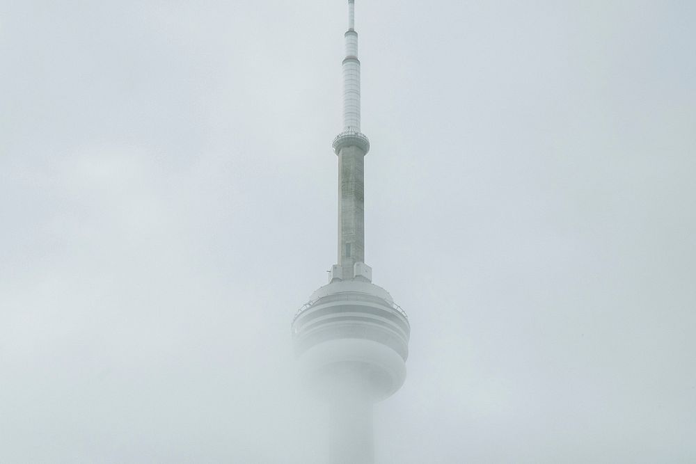 Space Needle tower in fog. Free public domain CC0 photo.