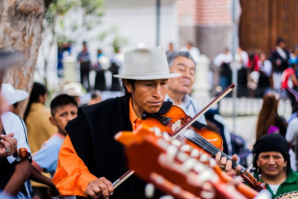 Peruvian street musician performing - unknown date & location