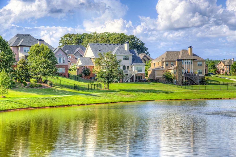 Houses near river. Free public domain CC0 image.