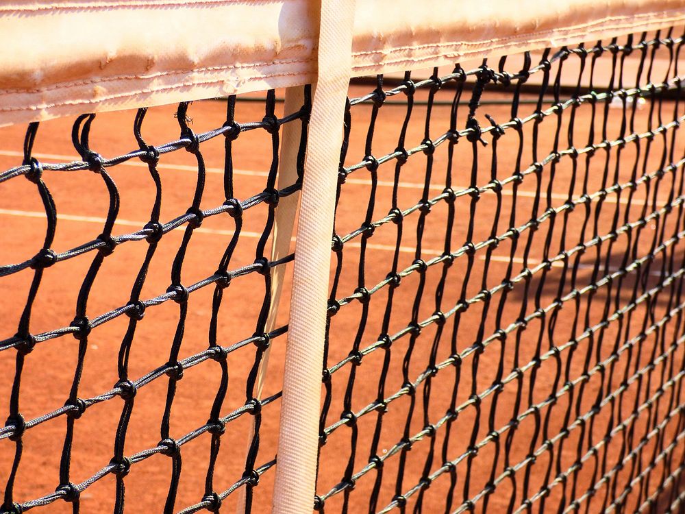 Closeup on tennis court net. Free public domain CC0 photo.