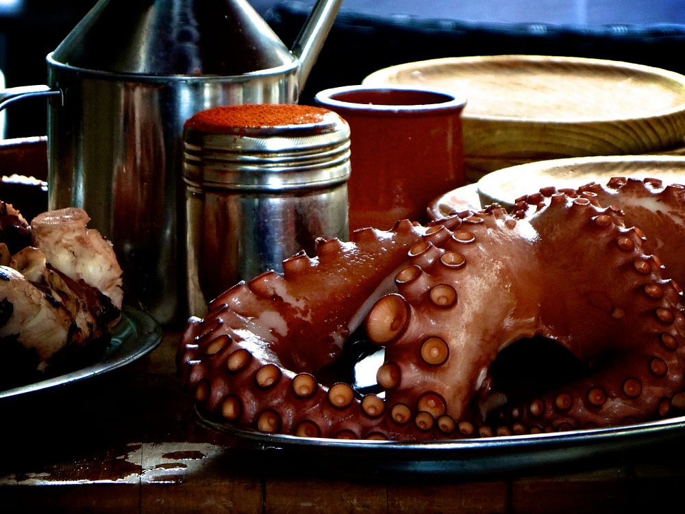 Boiled octopus on plate. Free public domain CC0 photo.