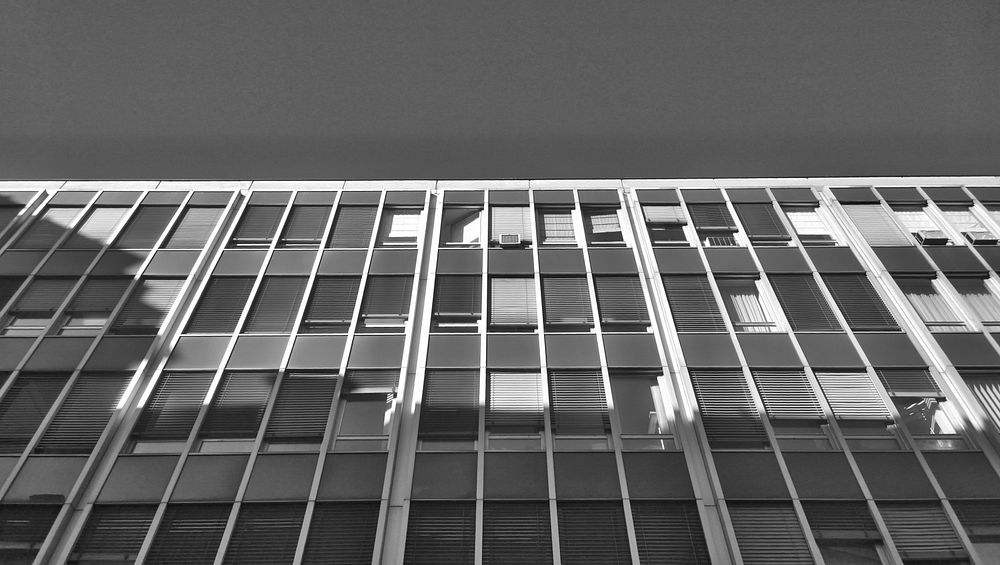 Black and white shot of apartment building. Free public domain CC0 photo.