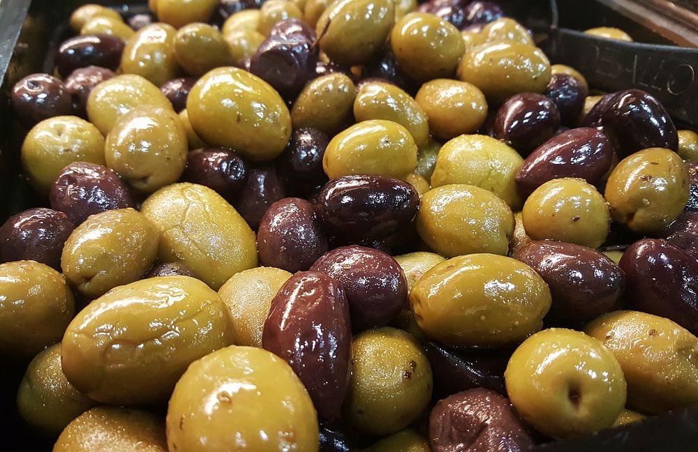 Closeup on pile of marinated olives. Free public domain CC0 image.
