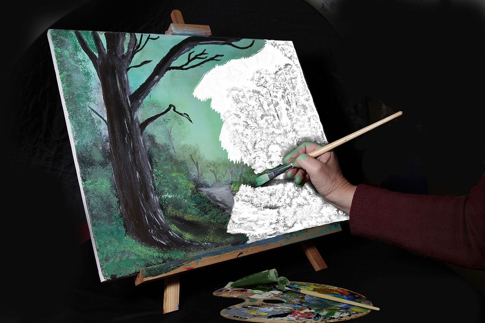 Artist painting a landscape. Free public domain CC0 photo.